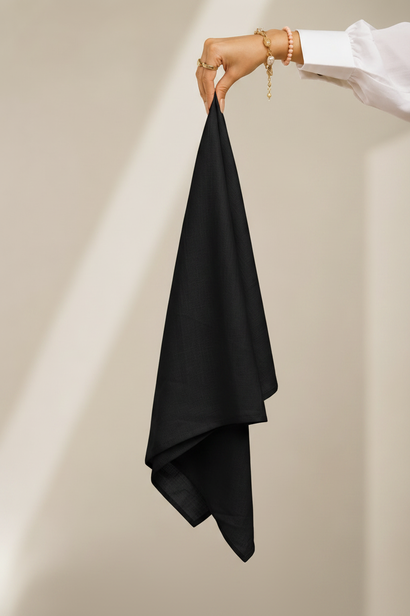 Jet Black Lawn Hijab - hand holding fabric