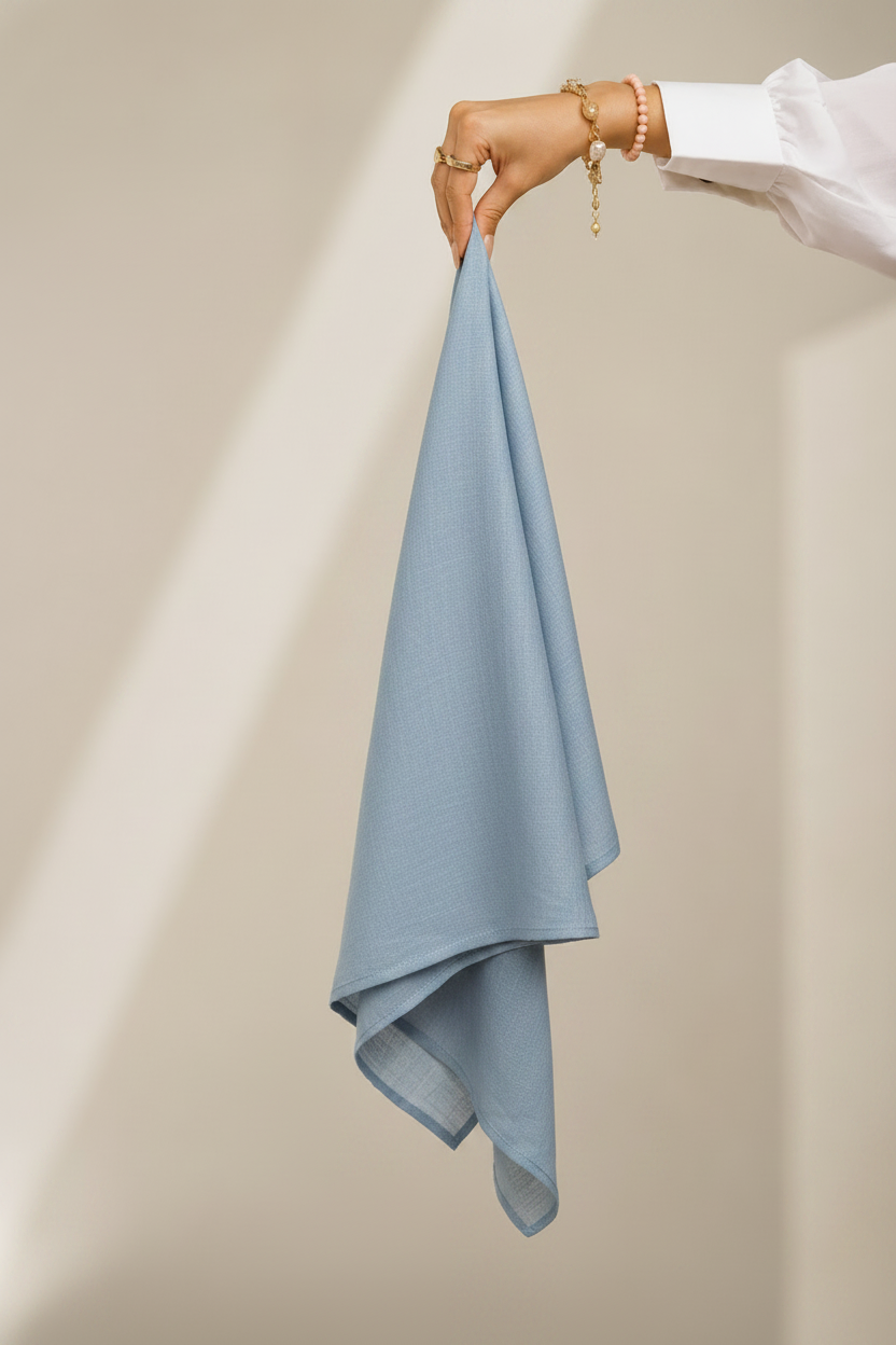 Ice Blue Lawn Hijab - hand holding fabric